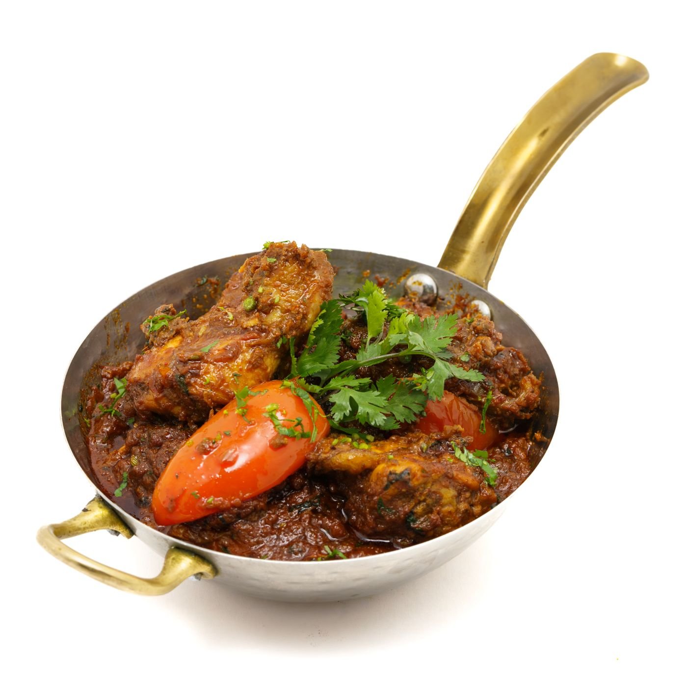 Spicy chicken curry served in a traditional pot