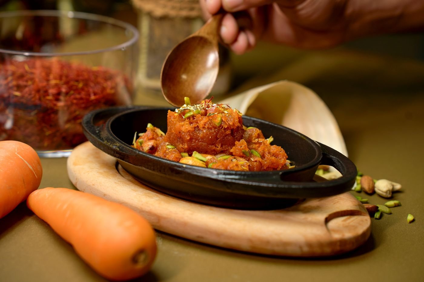 Gajar halwa garnished with pistachios