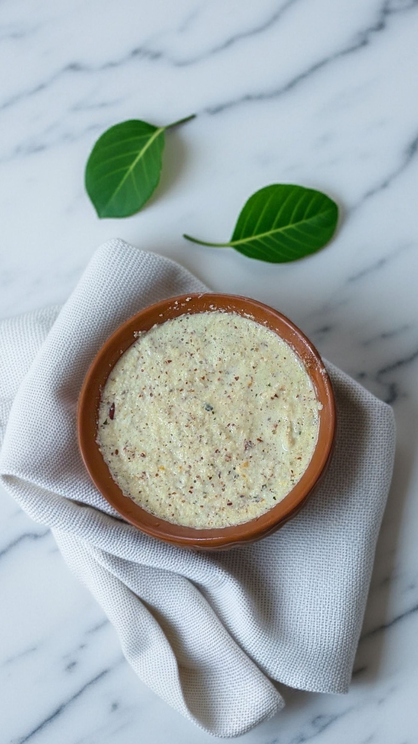Homemade kheer rice pudding in an earthenware bowl